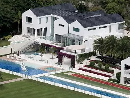 Look Inside Tiger Woods' $50M Island House: Straw Roofs, Endless Pools, And Beach Style